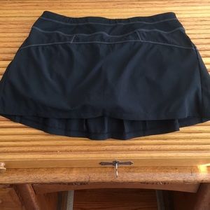 XS Athleta tennis skirt / skort with back pleats and purple althetic shorts, EUC